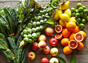 a group of fruits and vegetables on a wood surface Healthy Weight Loss Diets Cannock